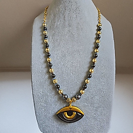 Altın ve Antrasit Küre Hematitler